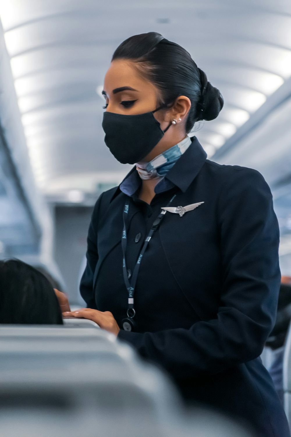 Flight attendant in the cabin - Flight Crew Recovery programme